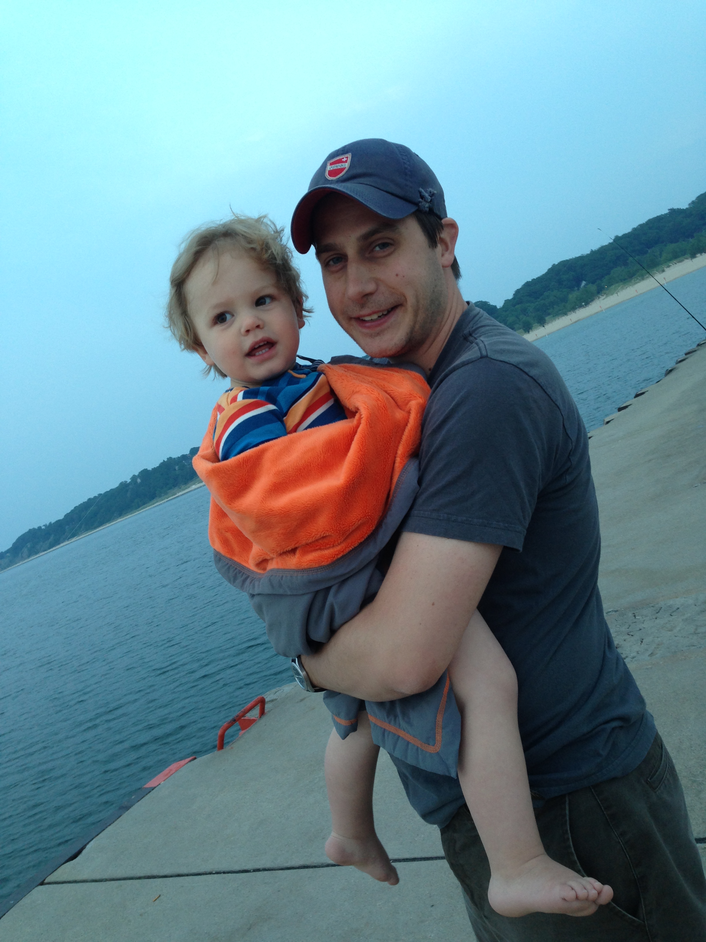 hank and dad at the end of the day. h can't take his eyes off of the barge that's dredging the lake ;)